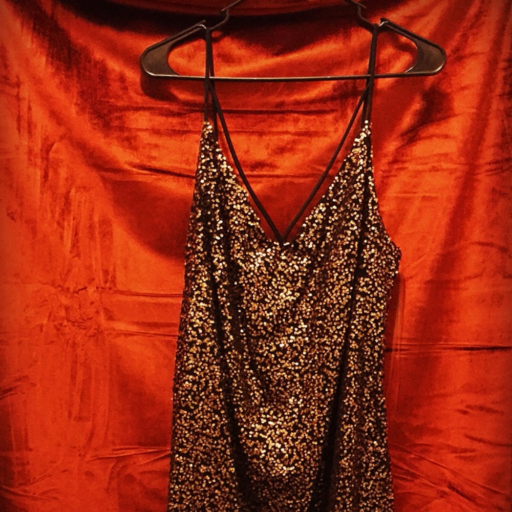 Black and gold sequin dress